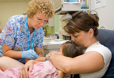 nurse-doing-infant-draw